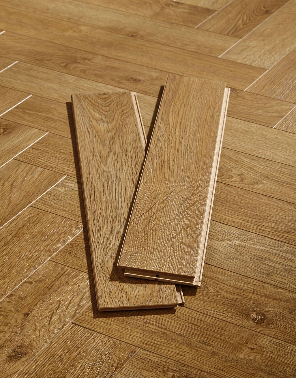 Vintage Chateau Herringbone - Golden Brown Laminate Flooring 3